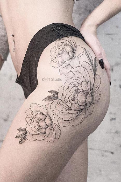 Женские татуировки на бедро